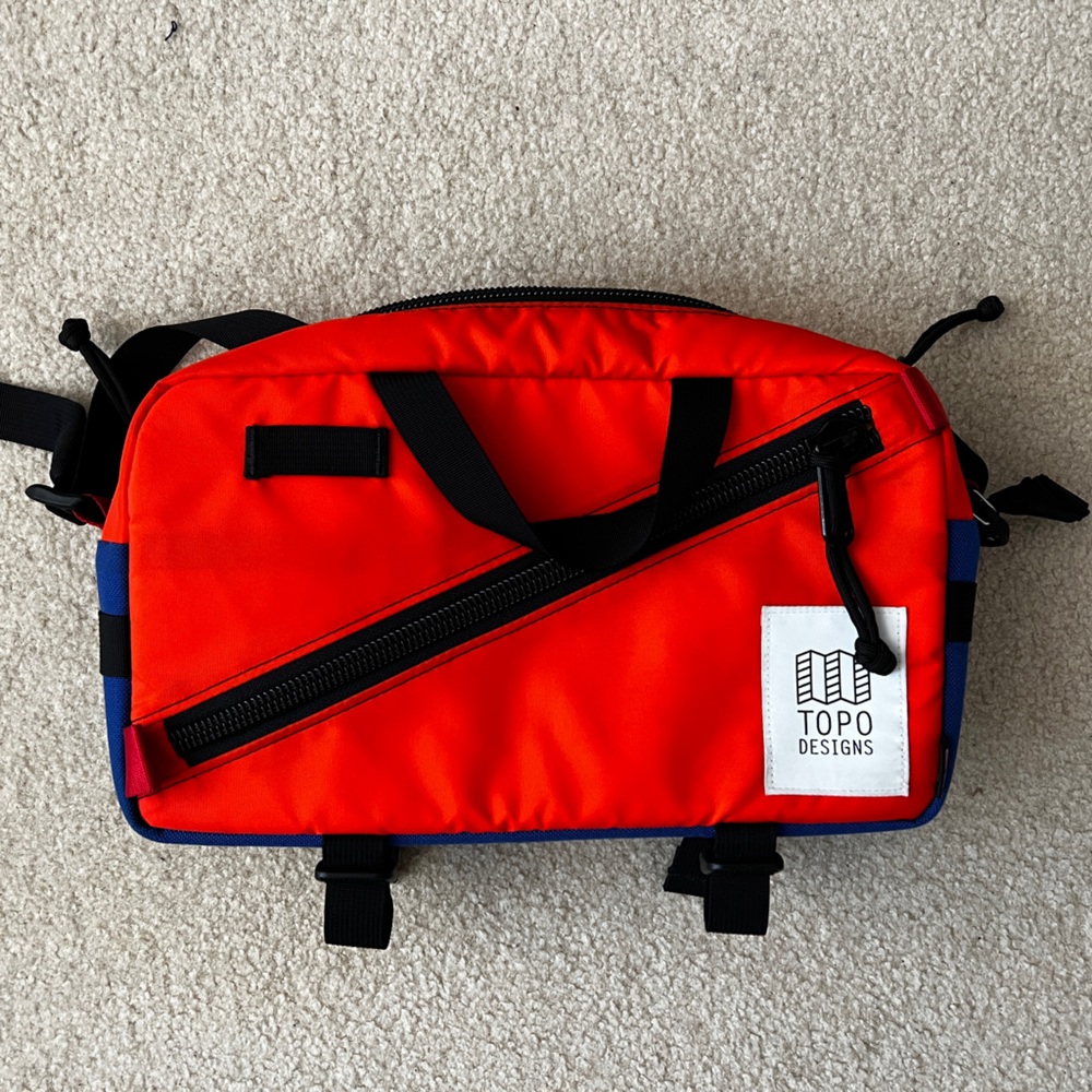 Topo Designs Quick Pack, orange and blue outdoor pack, 13"w x 7"h x 4"d